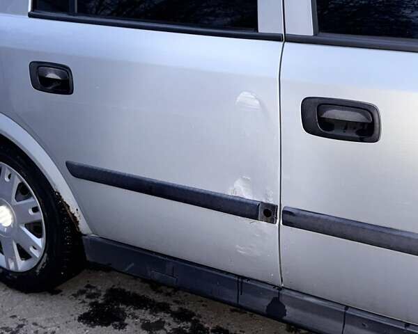 Серый Опель Астра, объемом двигателя 1.4 л и пробегом 140 тыс. км за 4500 $, фото 6 на Automoto.ua