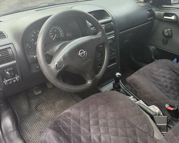 Серый Опель Астра, объемом двигателя 1.4 л и пробегом 279 тыс. км за 4300 $, фото 4 на Automoto.ua