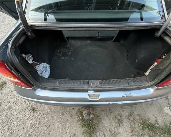 Серый Опель Астра, объемом двигателя 1.4 л и пробегом 228 тыс. км за 4000 $, фото 2 на Automoto.ua