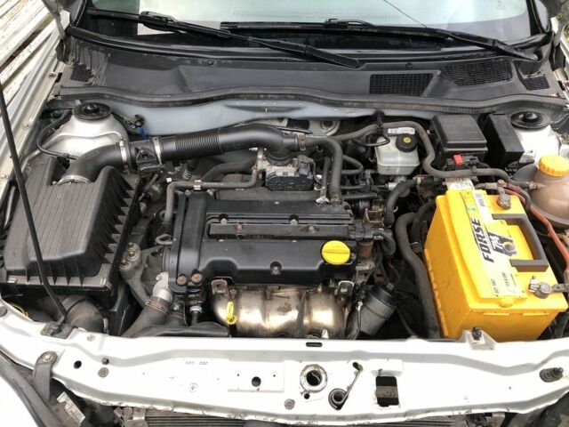 Серый Опель Астра, объемом двигателя 1.4 л и пробегом 207 тыс. км за 3500 $, фото 6 на Automoto.ua