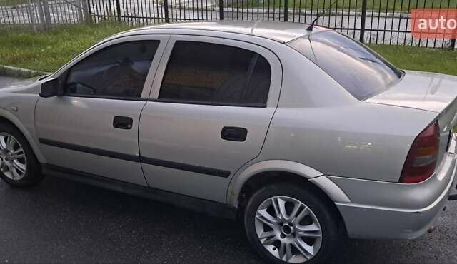 Серый Опель Астра, объемом двигателя 1.39 л и пробегом 202 тыс. км за 3000 $, фото 5 на Automoto.ua