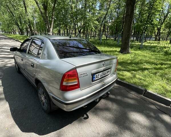 Серый Опель Астра, объемом двигателя 1.6 л и пробегом 176 тыс. км за 4750 $, фото 7 на Automoto.ua