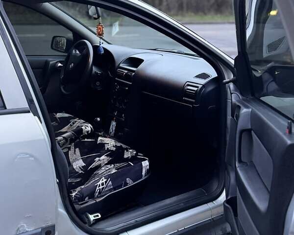 Серый Опель Астра, объемом двигателя 1.4 л и пробегом 140 тыс. км за 4500 $, фото 11 на Automoto.ua