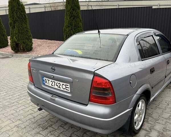 Серый Опель Астра, объемом двигателя 1.6 л и пробегом 314 тыс. км за 2999 $, фото 2 на Automoto.ua