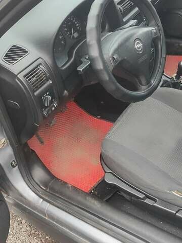 Серый Опель Астра, объемом двигателя 1.4 л и пробегом 250 тыс. км за 3000 $, фото 2 на Automoto.ua