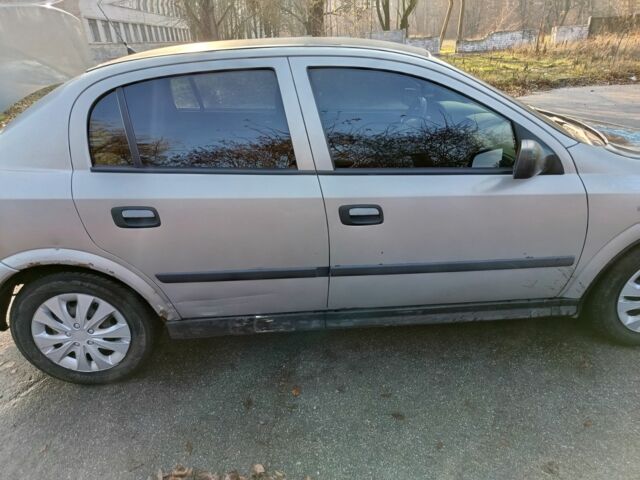 Серый Опель Астра, объемом двигателя 1.4 л и пробегом 342 тыс. км за 2200 $, фото 3 на Automoto.ua