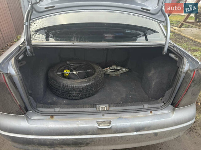 Серый Опель Астра, объемом двигателя 1.4 л и пробегом 279 тыс. км за 4300 $, фото 6 на Automoto.ua