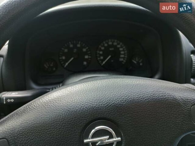 Серый Опель Астра, объемом двигателя 1.6 л и пробегом 59 тыс. км за 6999 $, фото 11 на Automoto.ua