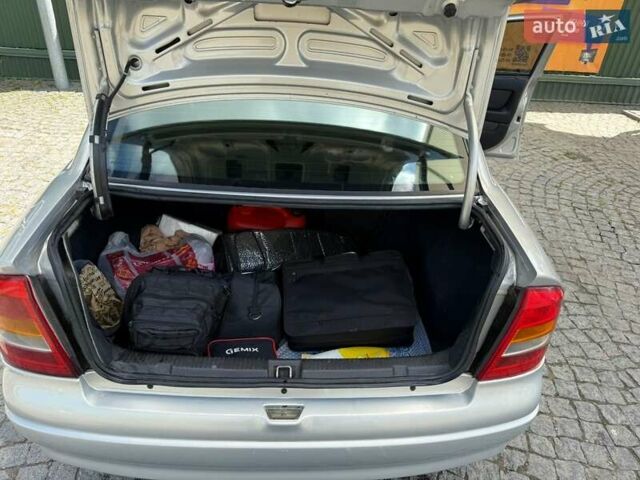 Серый Опель Астра, объемом двигателя 1.4 л и пробегом 211 тыс. км за 3200 $, фото 1 на Automoto.ua