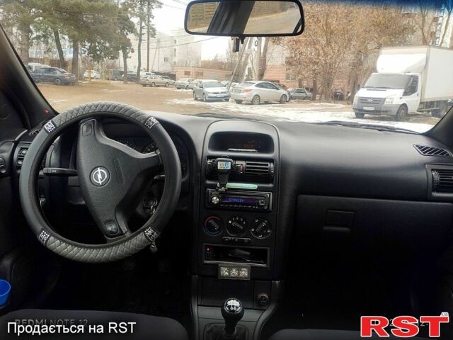 Серый Опель Астра, объемом двигателя 1.6 л и пробегом 220 тыс. км за 3100 $, фото 3 на Automoto.ua