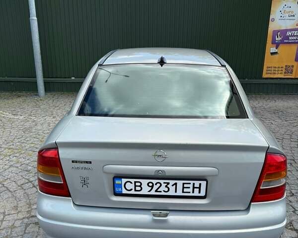 Серый Опель Астра, объемом двигателя 1.4 л и пробегом 211 тыс. км за 3200 $, фото 2 на Automoto.ua