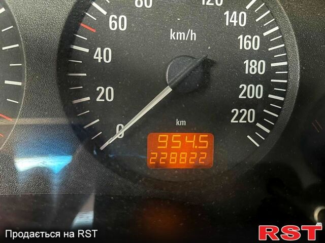 Серый Опель Астра, объемом двигателя 1.4 л и пробегом 228 тыс. км за 4000 $, фото 8 на Automoto.ua