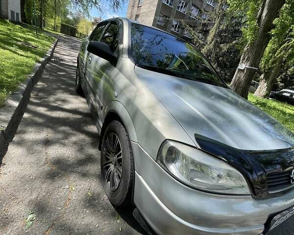 Серый Опель Астра, объемом двигателя 1.6 л и пробегом 176 тыс. км за 4750 $, фото 8 на Automoto.ua