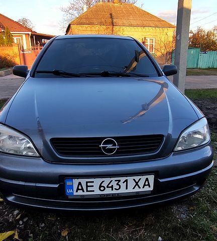 Серый Опель Астра, объемом двигателя 1.4 л и пробегом 285 тыс. км за 4200 $, фото 9 на Automoto.ua