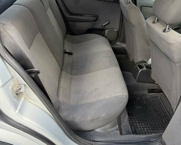 Серый Опель Астра, объемом двигателя 1.4 л и пробегом 211 тыс. км за 3200 $, фото 12 на Automoto.ua