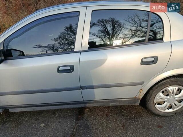 Серый Опель Астра, объемом двигателя 1.4 л и пробегом 342 тыс. км за 2200 $, фото 3 на Automoto.ua