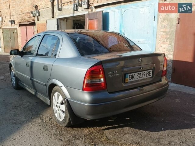 Серый Опель Астра, объемом двигателя 1.4 л и пробегом 263 тыс. км за 4000 $, фото 2 на Automoto.ua