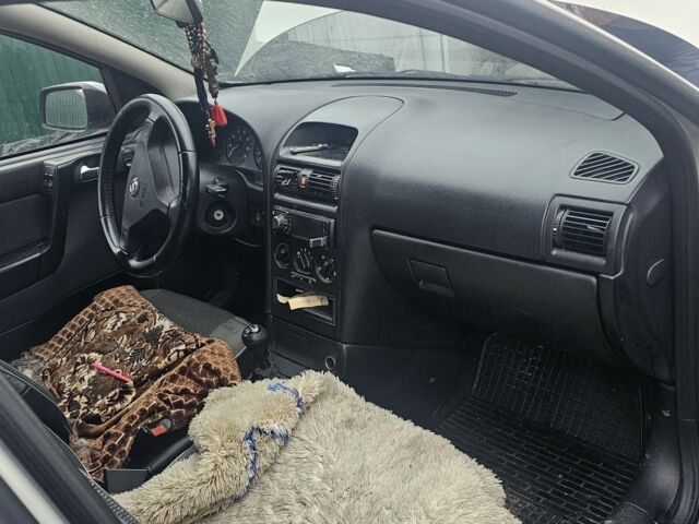 Серый Опель Астра, объемом двигателя 1.6 л и пробегом 60 тыс. км за 3300 $, фото 6 на Automoto.ua