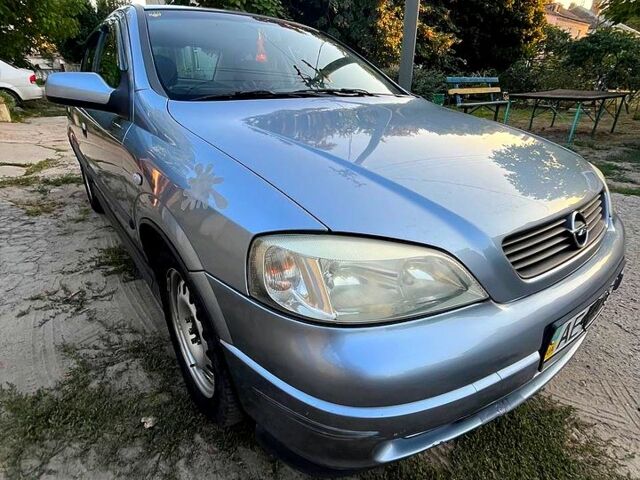 Серый Опель Астра, объемом двигателя 1.4 л и пробегом 228 тыс. км за 4000 $, фото 7 на Automoto.ua