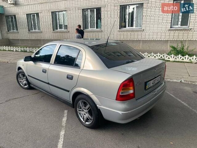 Сірий Опель Астра, об'ємом двигуна 1.6 л та пробігом 59 тис. км за 6000 $, фото 2 на Automoto.ua