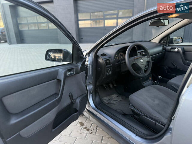 Серый Опель Астра, объемом двигателя 1.4 л и пробегом 139 тыс. км за 4000 $, фото 6 на Automoto.ua