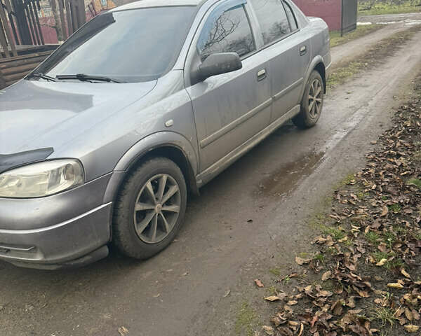 Серый Опель Астра, объемом двигателя 1.4 л и пробегом 279 тыс. км за 4300 $, фото 1 на Automoto.ua