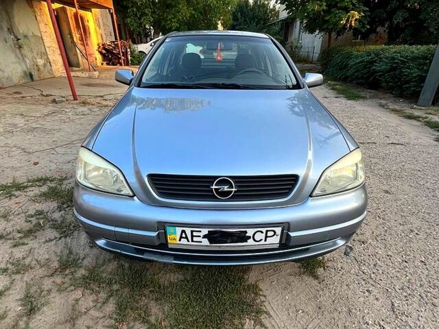 Серый Опель Астра, объемом двигателя 1.4 л и пробегом 228 тыс. км за 4000 $, фото 6 на Automoto.ua
