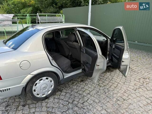 Серый Опель Астра, объемом двигателя 1.4 л и пробегом 211 тыс. км за 3200 $, фото 13 на Automoto.ua