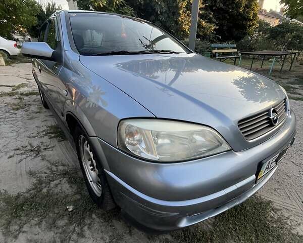 Серый Опель Астра, объемом двигателя 1.4 л и пробегом 228 тыс. км за 4000 $, фото 8 на Automoto.ua