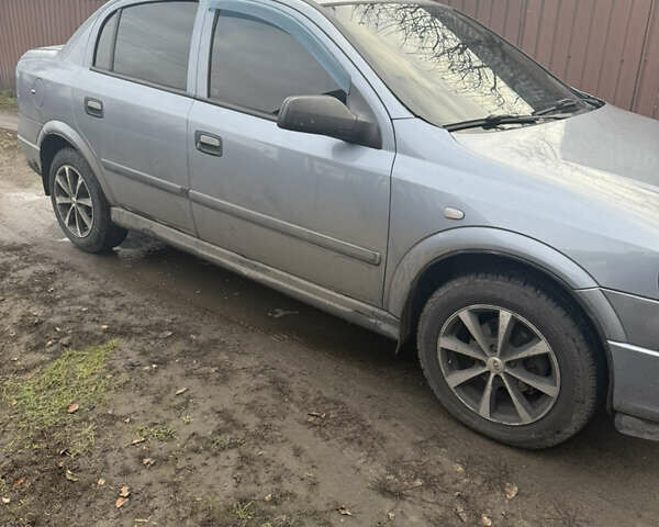 Серый Опель Астра, объемом двигателя 1.4 л и пробегом 279 тыс. км за 4300 $, фото 2 на Automoto.ua