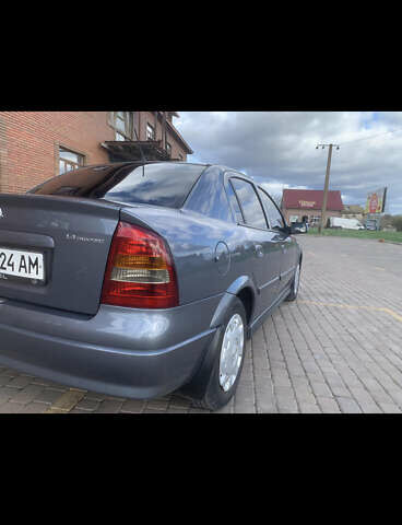 Серый Опель Астра, объемом двигателя 1.4 л и пробегом 266 тыс. км за 4500 $, фото 3 на Automoto.ua