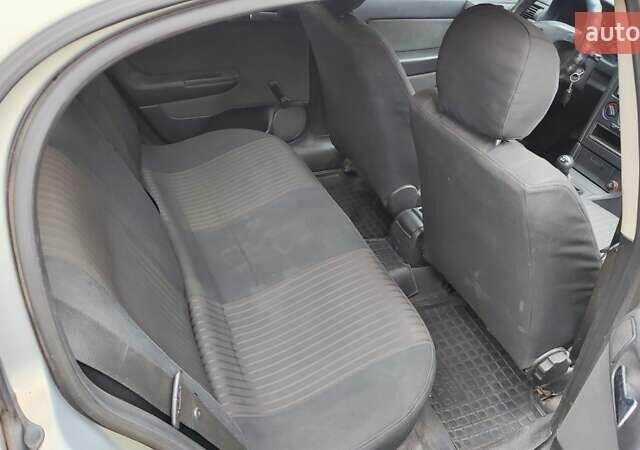 Серый Опель Астра, объемом двигателя 1.6 л и пробегом 198 тыс. км за 4600 $, фото 6 на Automoto.ua