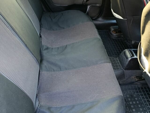 Серый Опель Астра, объемом двигателя 1.4 л и пробегом 342 тыс. км за 2200 $, фото 7 на Automoto.ua