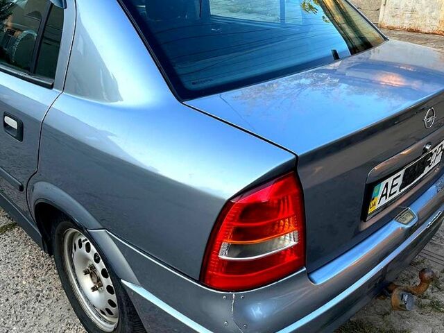 Серый Опель Астра, объемом двигателя 1.4 л и пробегом 228 тыс. км за 4000 $, фото 2 на Automoto.ua