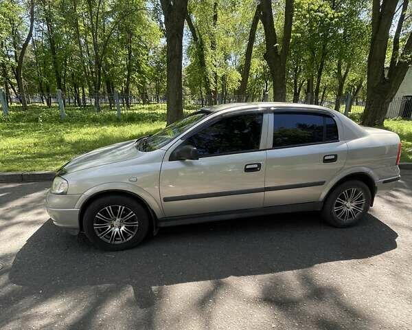 Серый Опель Астра, объемом двигателя 1.6 л и пробегом 176 тыс. км за 4750 $, фото 4 на Automoto.ua