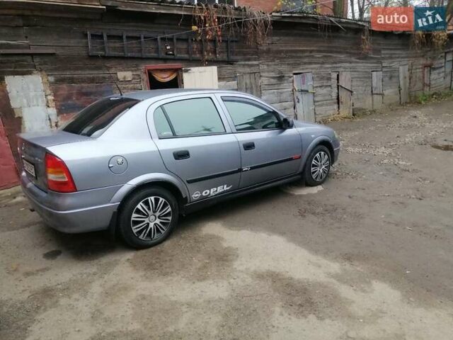 Серый Опель Астра, объемом двигателя 1.6 л и пробегом 202 тыс. км за 3300 $, фото 7 на Automoto.ua