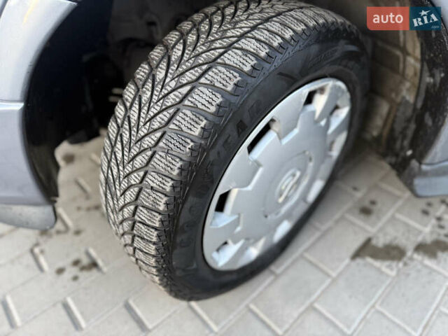 Серый Опель Астра, объемом двигателя 1.4 л и пробегом 139 тыс. км за 4000 $, фото 11 на Automoto.ua