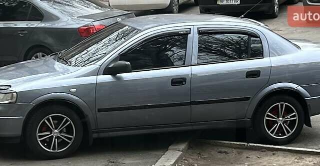 Серый Опель Астра, объемом двигателя 1.4 л и пробегом 173 тыс. км за 5500 $, фото 2 на Automoto.ua