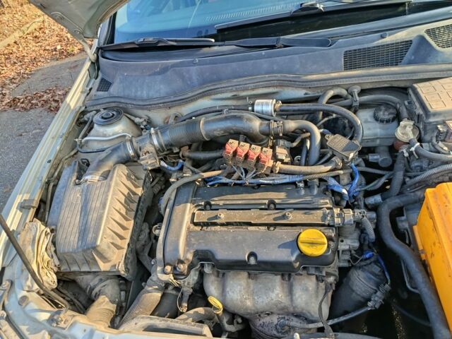 Серый Опель Астра, объемом двигателя 1.4 л и пробегом 342 тыс. км за 2200 $, фото 9 на Automoto.ua