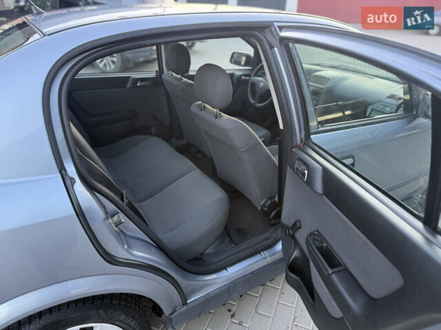 Серый Опель Астра, объемом двигателя 1.4 л и пробегом 139 тыс. км за 4000 $, фото 8 на Automoto.ua