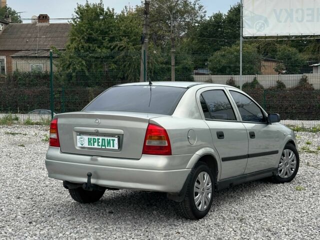 Серый Опель Астра, объемом двигателя 1.6 л и пробегом 283 тыс. км за 4000 $, фото 1 на Automoto.ua