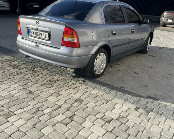 Серый Опель Астра, объемом двигателя 1.4 л и пробегом 293 тыс. км за 3600 $, фото 3 на Automoto.ua