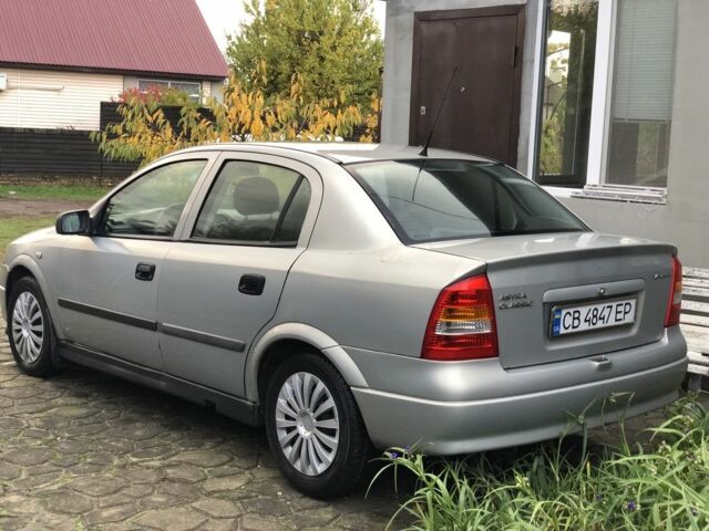 Серый Опель Астра, объемом двигателя 1.4 л и пробегом 207 тыс. км за 3500 $, фото 3 на Automoto.ua