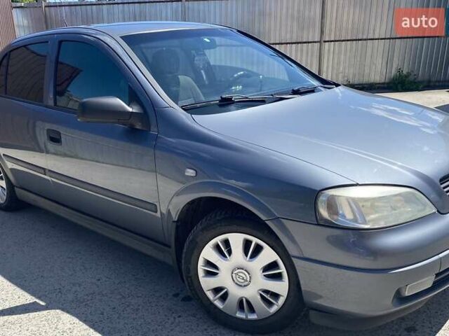 Серый Опель Астра, объемом двигателя 1.6 л и пробегом 160 тыс. км за 4600 $, фото 3 на Automoto.ua