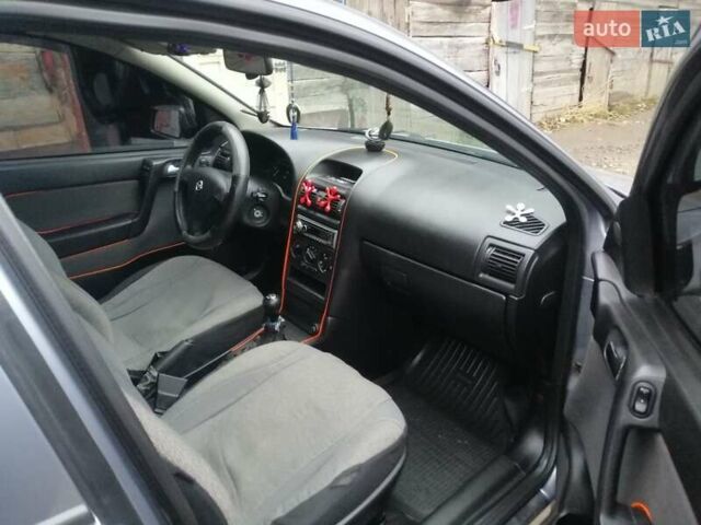 Серый Опель Астра, объемом двигателя 1.6 л и пробегом 202 тыс. км за 3300 $, фото 4 на Automoto.ua