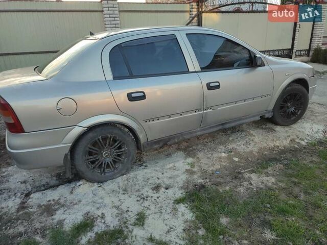 Серый Опель Астра, объемом двигателя 1.4 л и пробегом 400 тыс. км за 2600 $, фото 6 на Automoto.ua