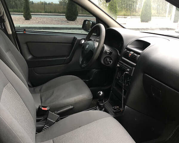 Серый Опель Астра, объемом двигателя 1.6 л и пробегом 356 тыс. км за 2600 $, фото 9 на Automoto.ua