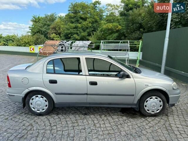 Серый Опель Астра, объемом двигателя 1.4 л и пробегом 211 тыс. км за 3200 $, фото 3 на Automoto.ua