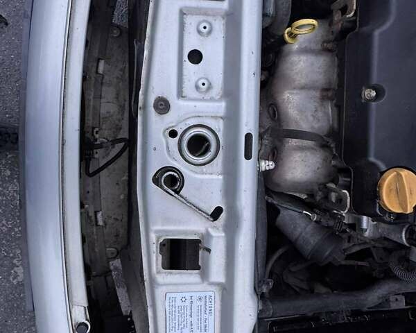 Серый Опель Астра, объемом двигателя 1.4 л и пробегом 140 тыс. км за 4500 $, фото 4 на Automoto.ua