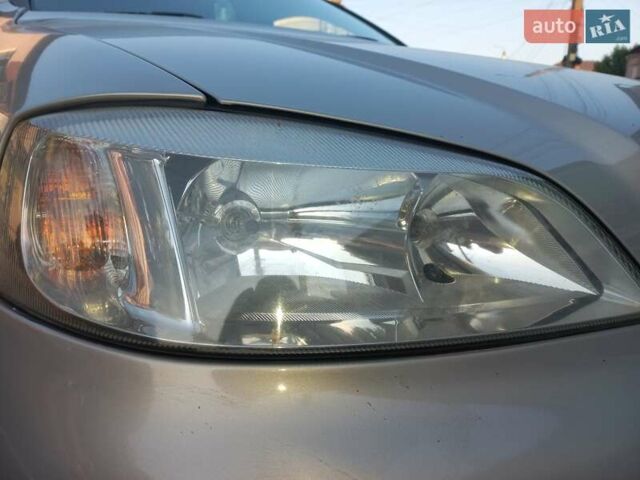 Серый Опель Астра, объемом двигателя 1.36 л и пробегом 175 тыс. км за 4500 $, фото 11 на Automoto.ua